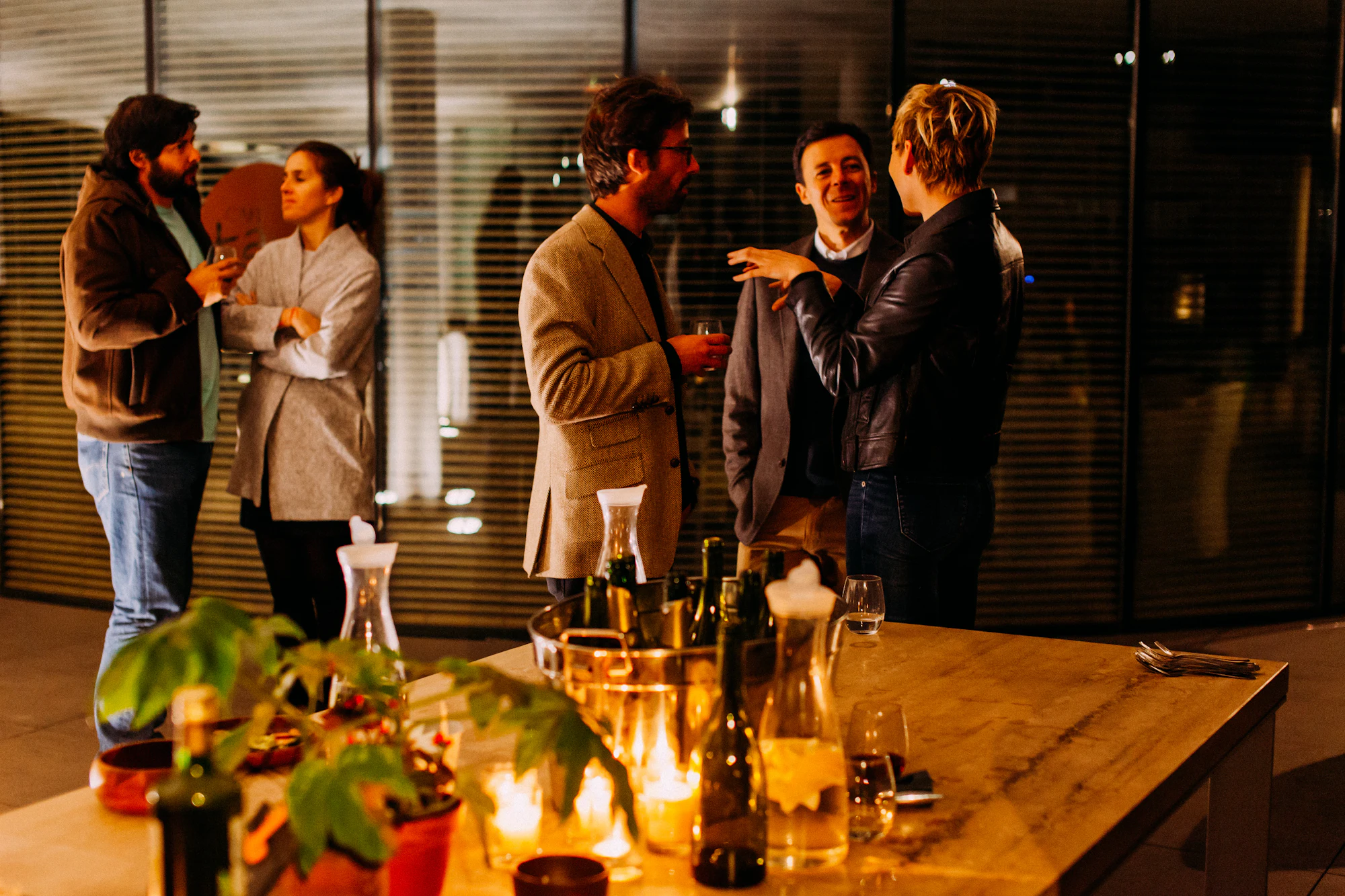 Professionals in conversation at a gathering